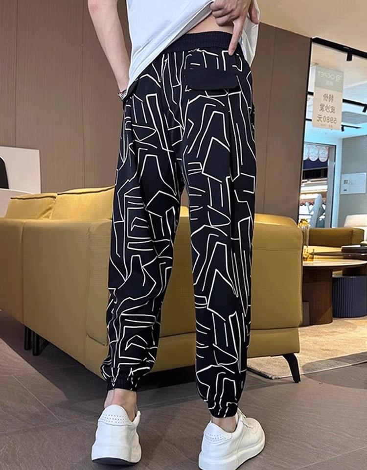 Pantalones cortos informales con abertura lateral y estampado de seda helada para hombre (50% de descuento)