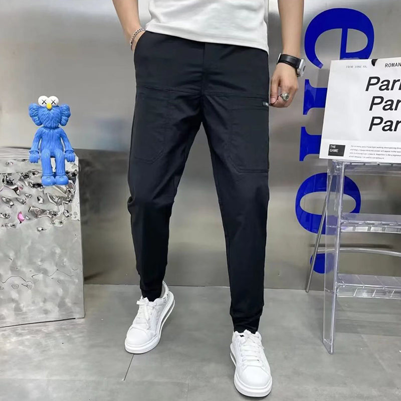 Pantalones cargo ajustados con múltiples bolsillos y elasticidad alta para hombre👖