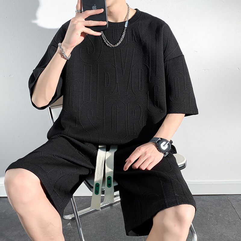 Conjunto de camiseta de manga corta y pantalones cortos de ajuste holgado para hombres