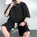 Conjunto de camiseta de manga corta y pantalones cortos de ajuste holgado para hombres
