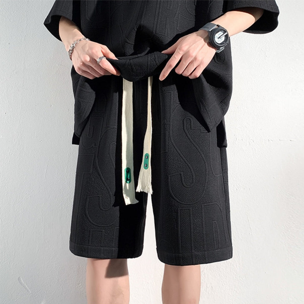 Conjunto de camiseta de manga corta y pantalones cortos de ajuste holgado para hombres