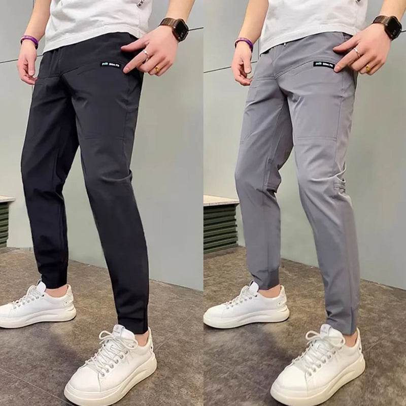 Pantalones cargo ajustados con múltiples bolsillos y elasticidad alta para hombre👖
