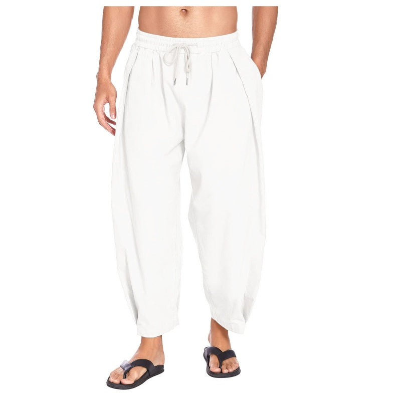 Pantalones casuales de hombre de corte holgado con cordón ajustable.