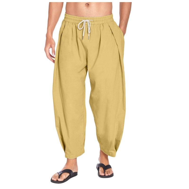 Pantalones casuales de hombre de corte holgado con cordón ajustable.