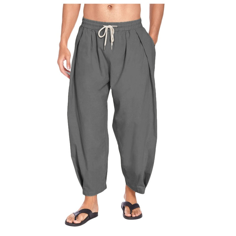 Pantalones casuales de hombre de corte holgado con cordón ajustable.