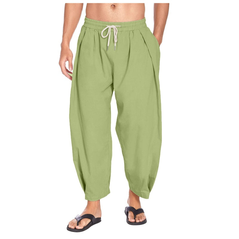 Pantalones casuales de hombre de corte holgado con cordón ajustable.