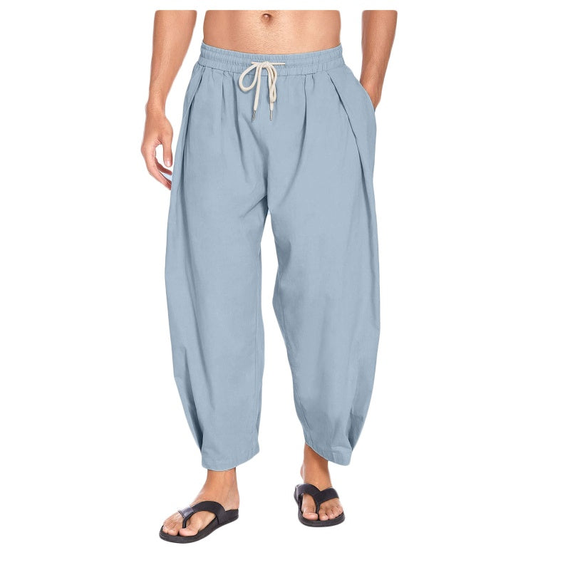 Pantalones casuales de hombre de corte holgado con cordón ajustable.