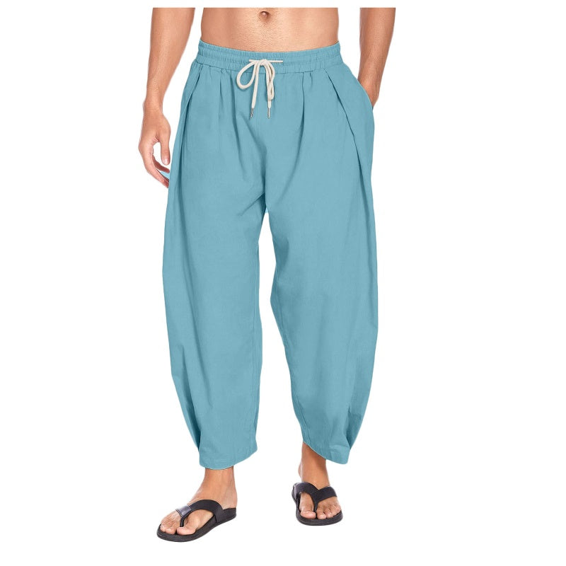Pantalones casuales de hombre de corte holgado con cordón ajustable.