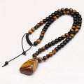 🔥50% DE DESCUENTO AHORA | Collar de cuentas de ojo de tigre KYAYU™ Warrior – Forja tu destino con una energía inquebrantable